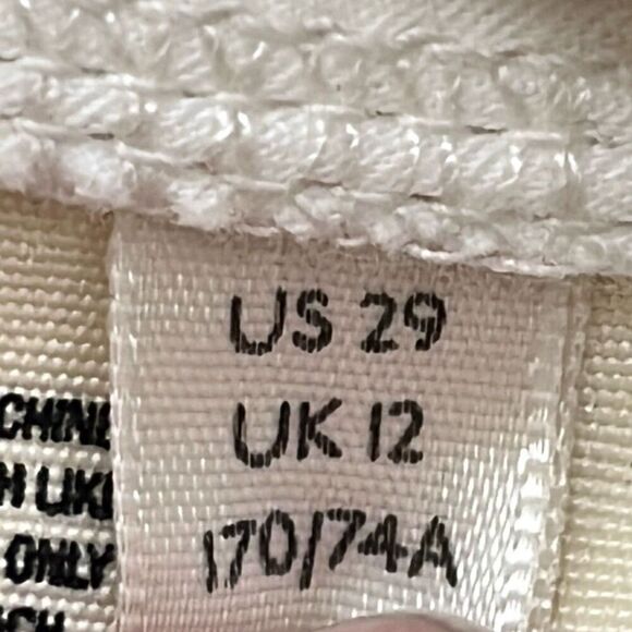 WE THE FREE Jean Mini Skirt Size 29 White Distressed Raw Cut Hem Button Fly - Picture 5 of 15